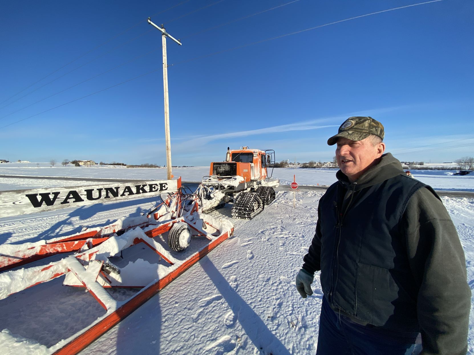 Grooming the snowmobile trail